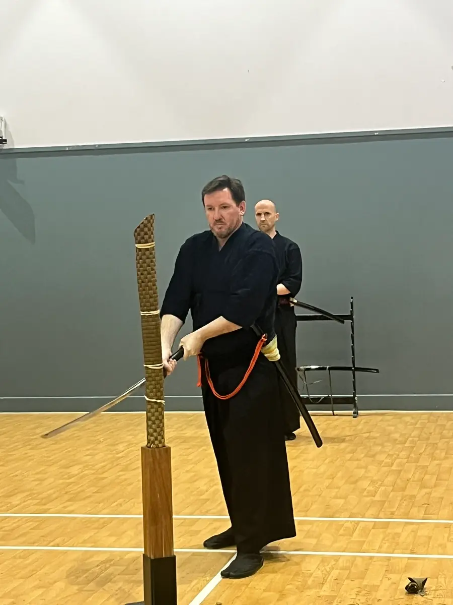 Tameshigiri - Completion of kesa giri (angular cut)
