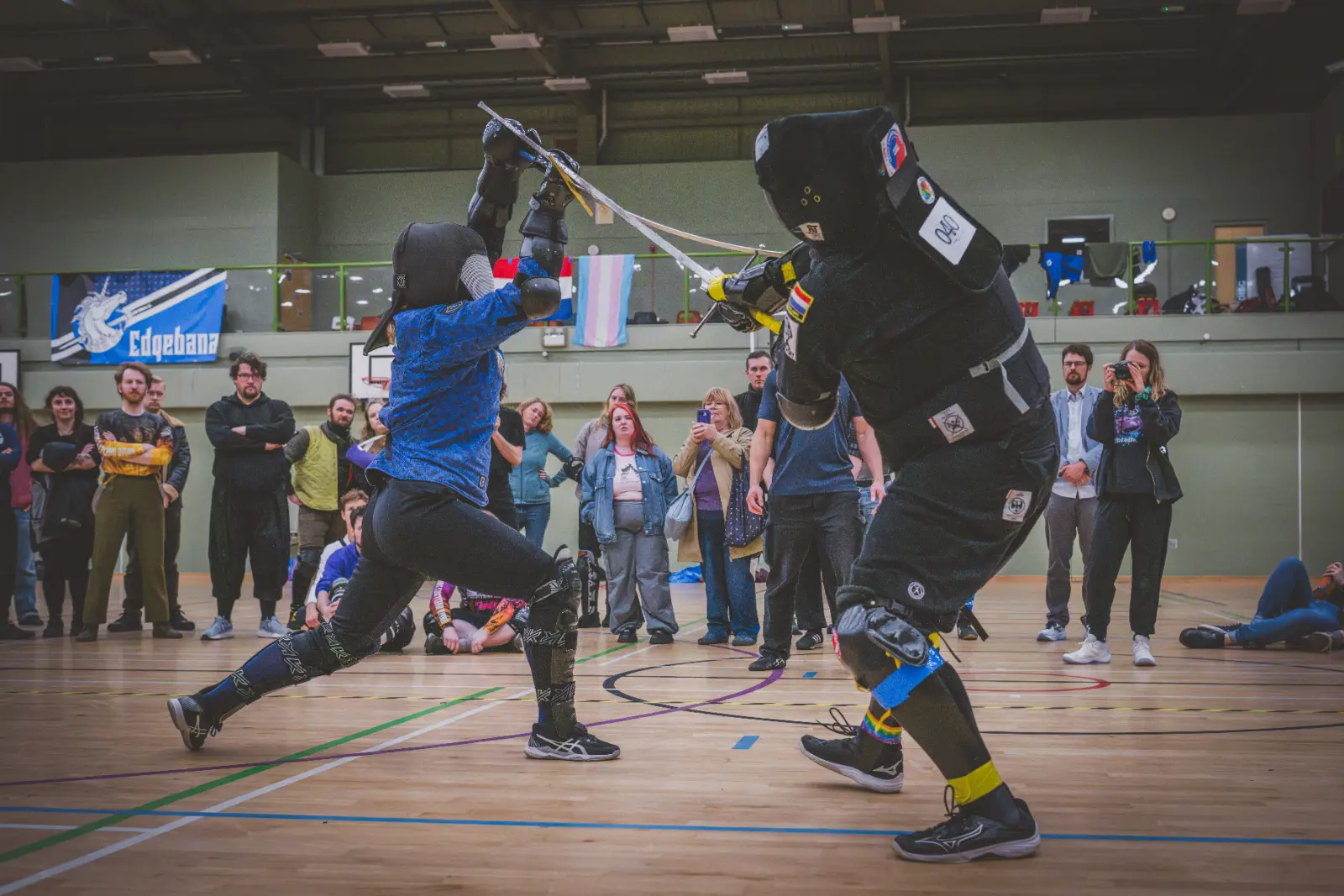 two fencers competing